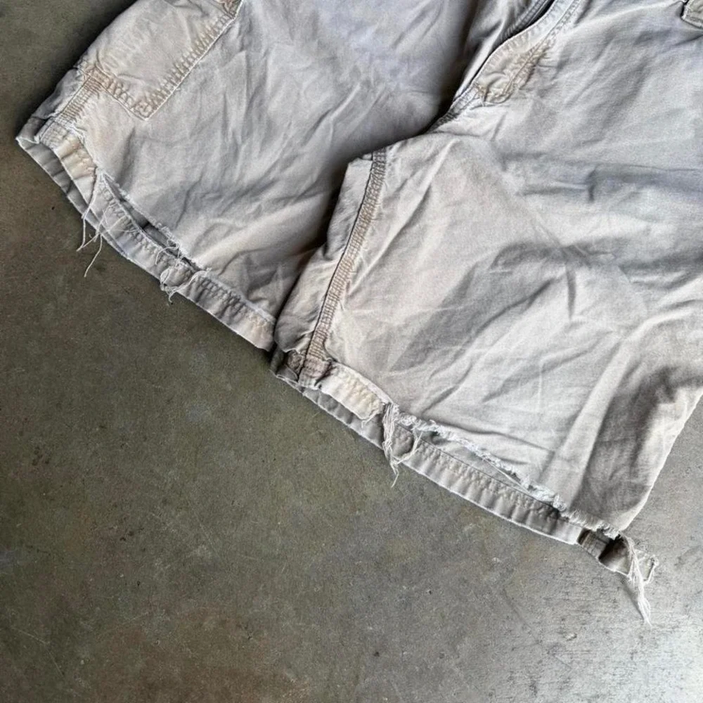 Vintage 90s Carhartt faded cream cargo distressed shorts